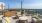 a patio with chairs and tables